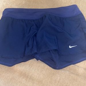 Little rip on the side. Worn a few times. Nike brand